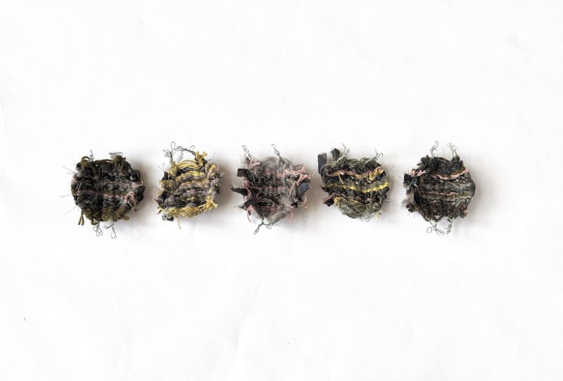 A series of weave samples exploring how wire interacts with my chosen materials. They also explore colour and texture proportions used in my outcome.