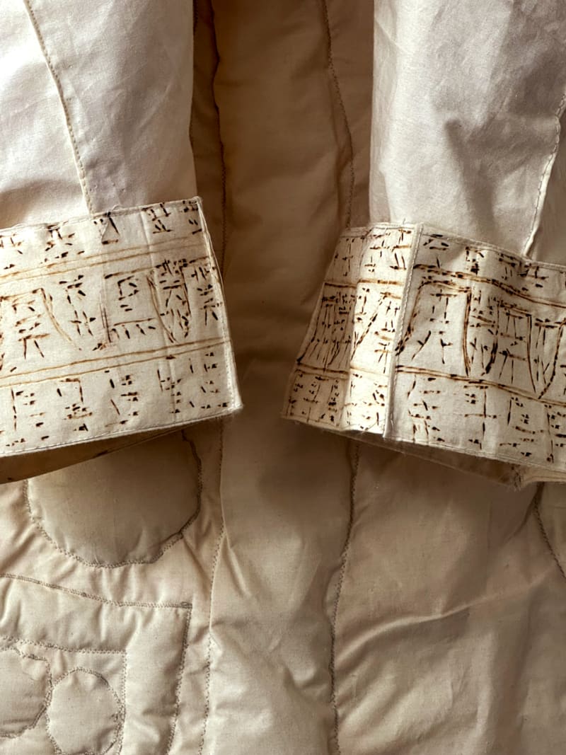 Close up shots of my garment - the sleeves which are decorated with pyrography