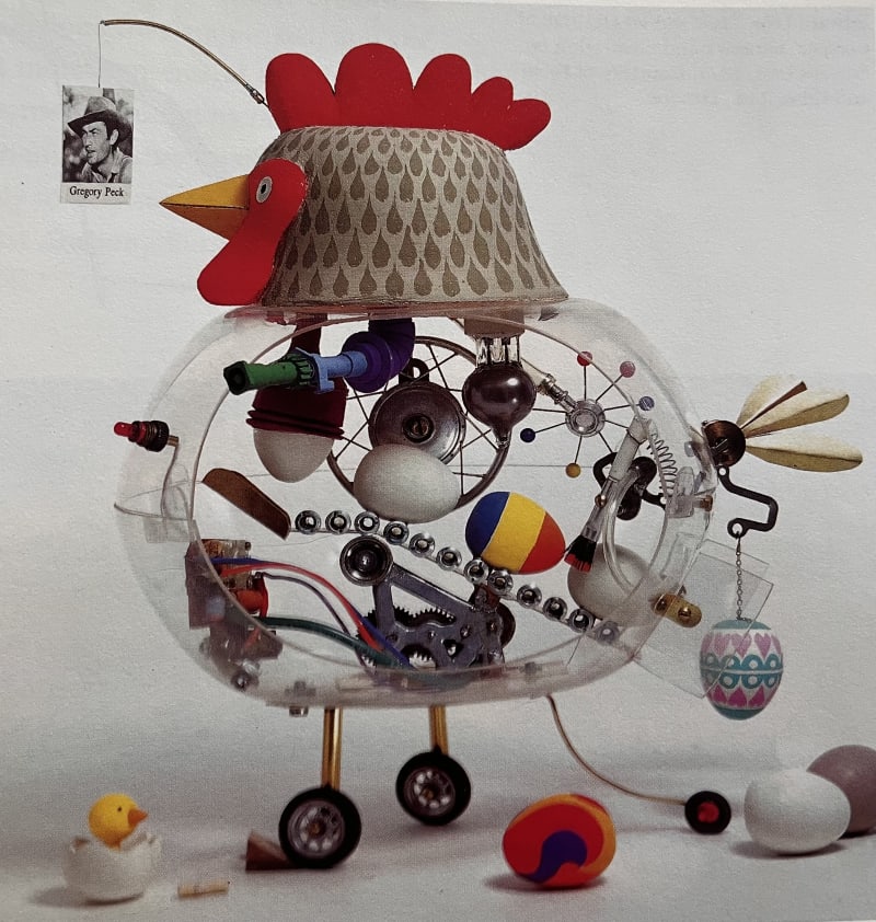 A hen constructed from different objects assembled together