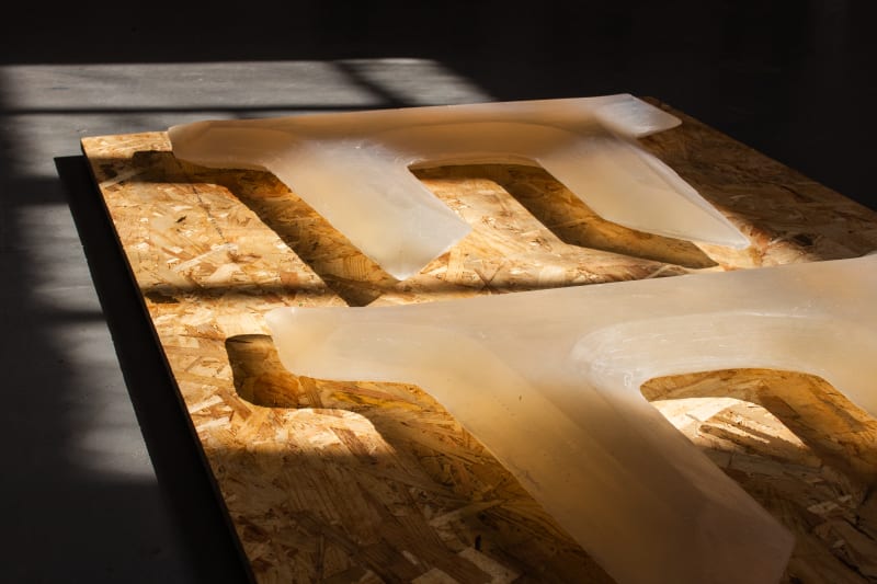 close up of gold leaf on a sheet of OSB, close up of shadows created by soap onto OSB