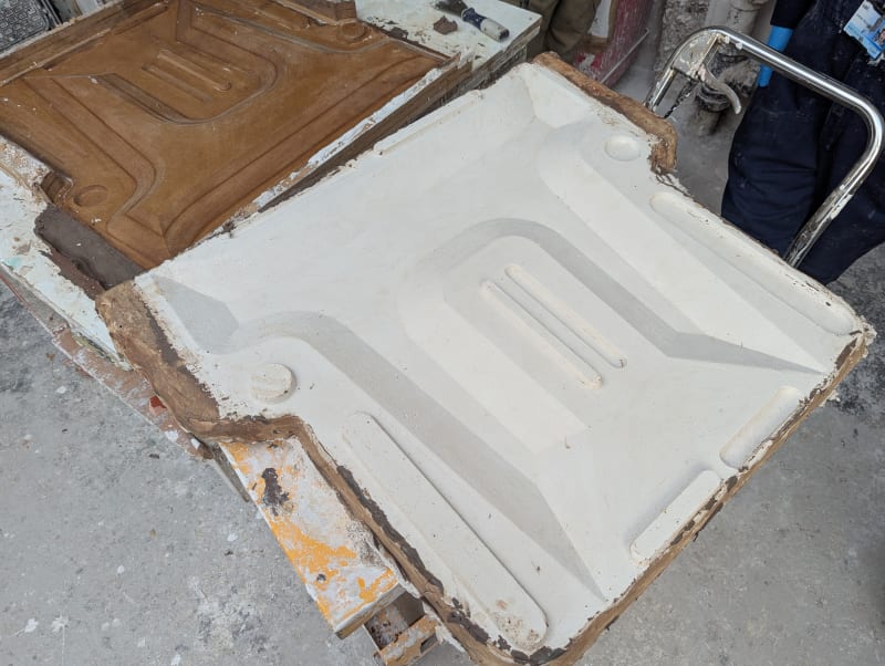 CAD model of a mold, MDF copy of CAD model, a plaster negative creating one half of a mold