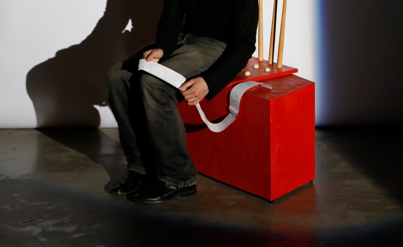 an AI chair that corresponds with its sitters via a receipt printer