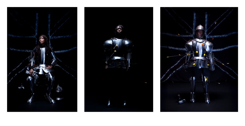 Triptych. A black female knight in front of a black union jack on the left and right and In a black void lit from above in the middle.