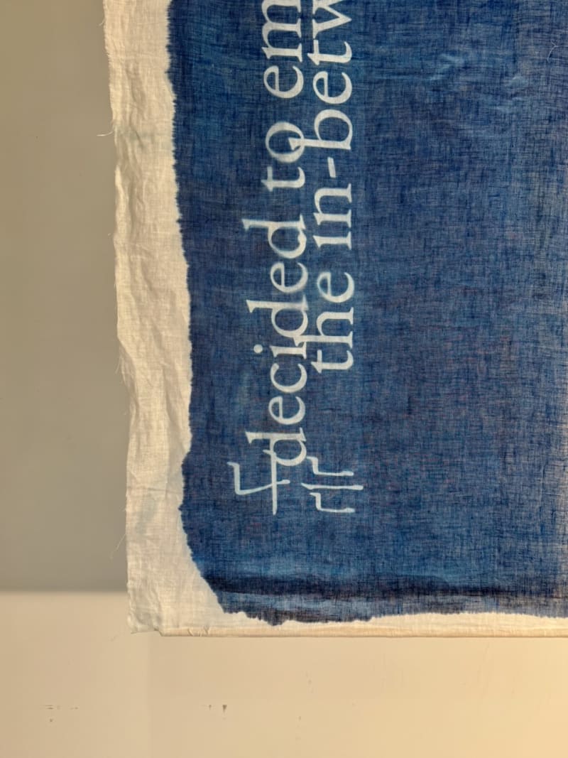 Four layered linens with cyanotype, screen print, and red thread exploring migration, memory, and in-betweenness.
