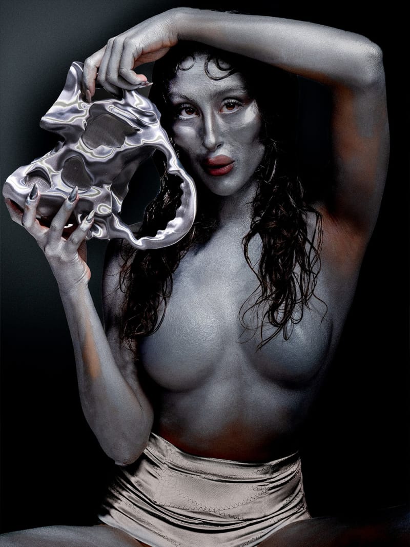 Silver woman holding bag.