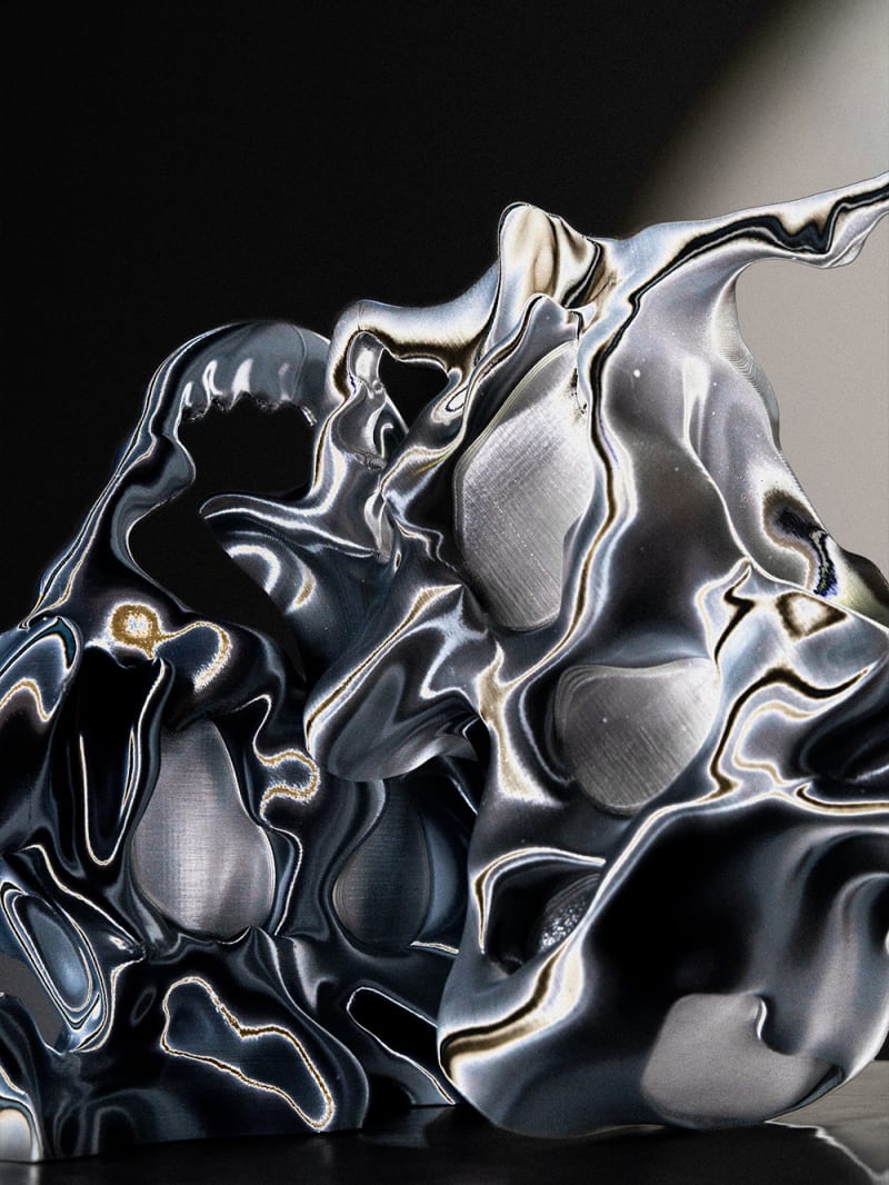 Still life of 2 chrome bags.