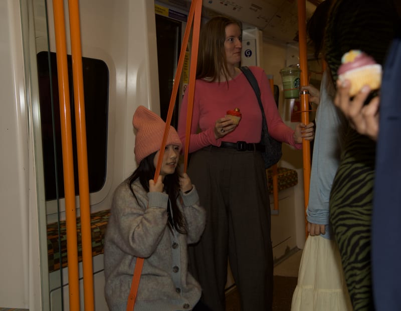 This is a lower swing designed for children, inviting people of different ages to join in the temporary party.