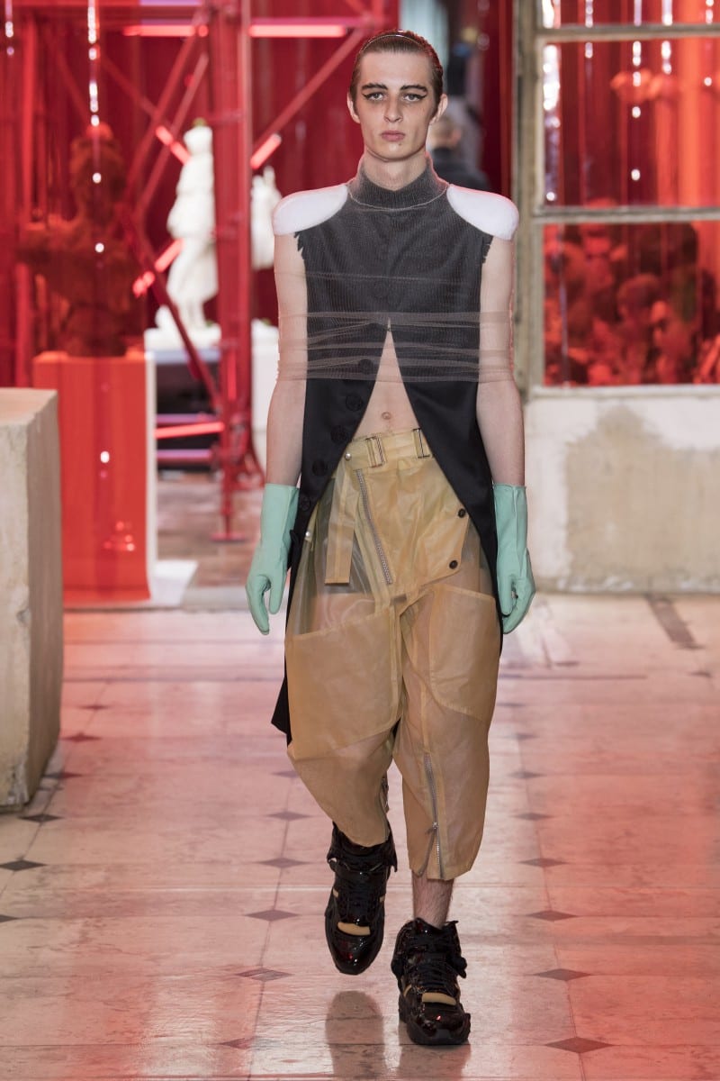 Model walking down the catwalk at the Maison Margiele Menswear 2018 show