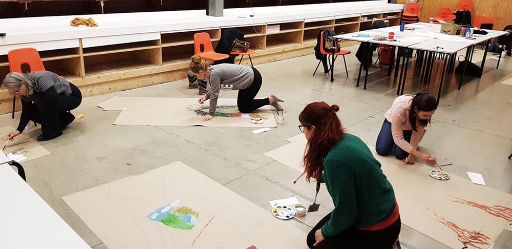Health and Wellbeing through Art Making Short Course students working in studio.