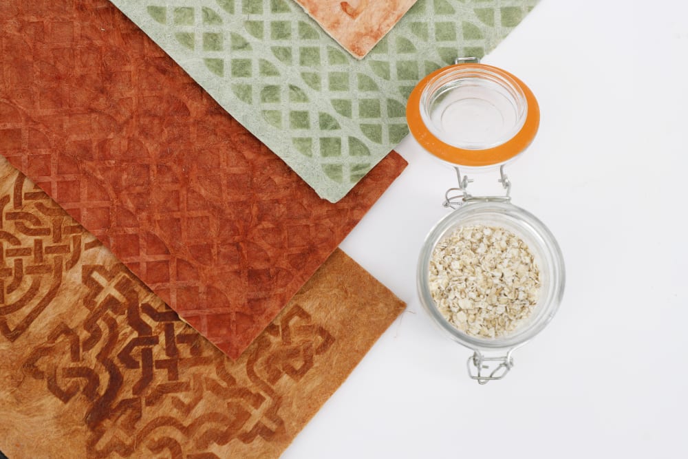 Patterned paper next to a jar of oats
