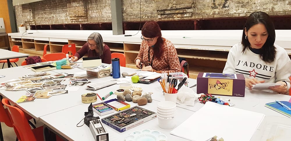 Health and Wellbeing through Art Making Short Course students working in studio.