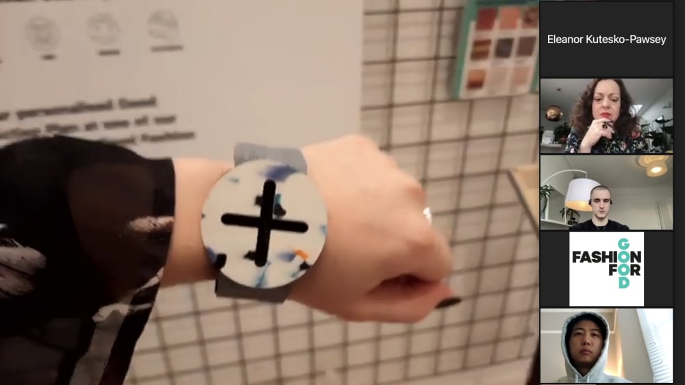 screenshot of students viewing virtual exhibition. image shows model wearing a wrist accessory