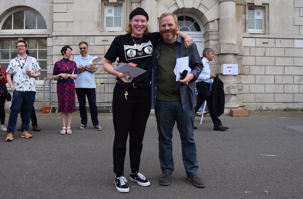 A man and woman posing for a photo together. 