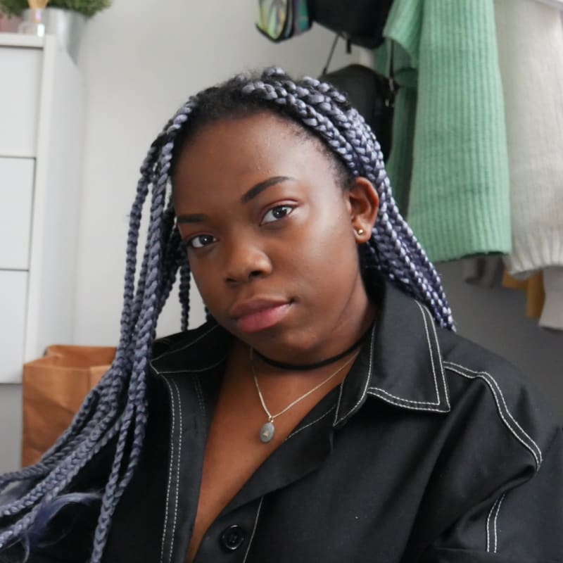 Photo of Alex looking into the camera. 