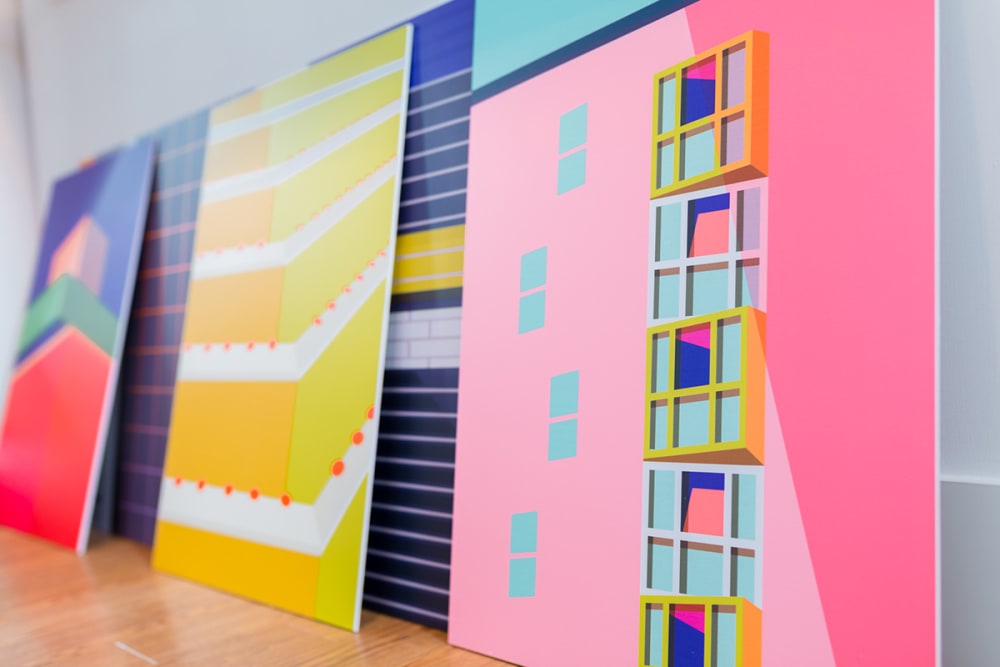 A photograph of brightly coloured geometric doors.