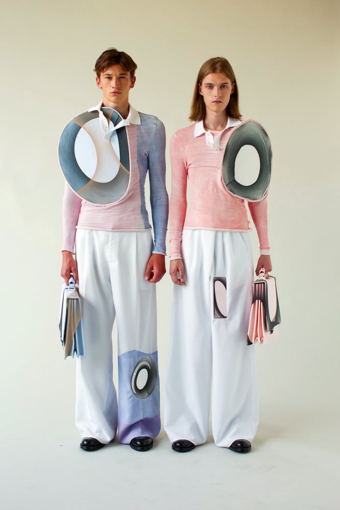 Two male models wearing a knitwear collection designed by CSM student.
