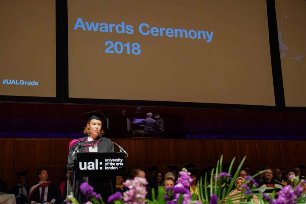 A student making a speech on the stage