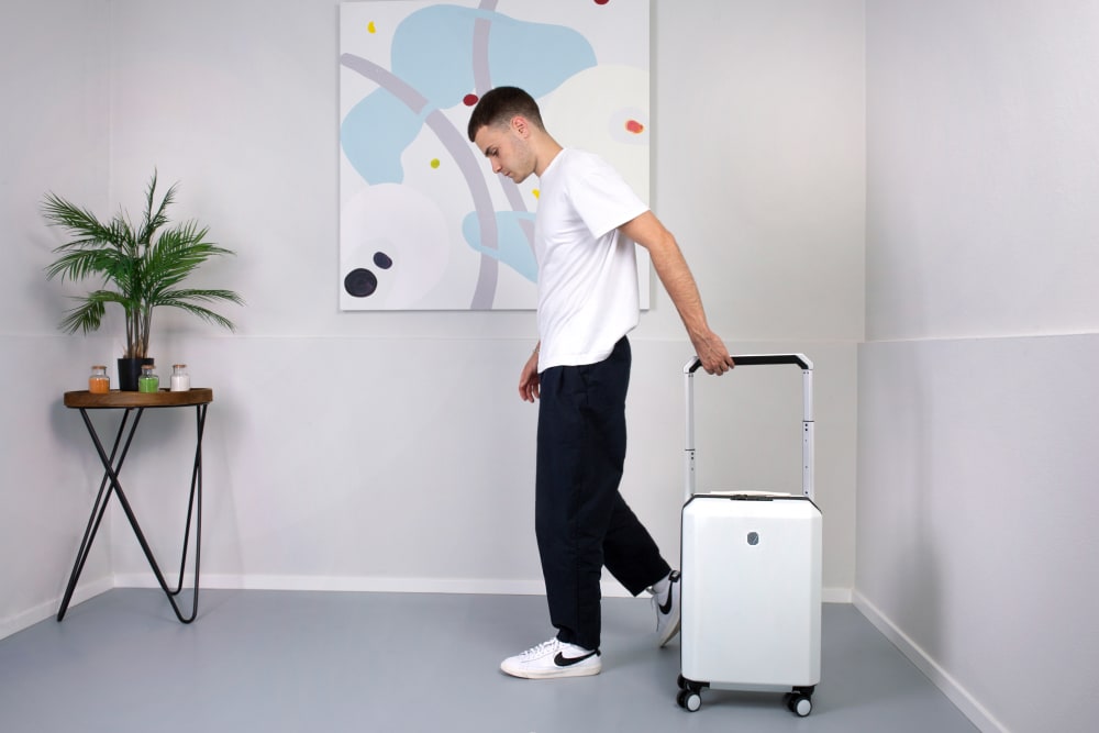 Man with white travel bag