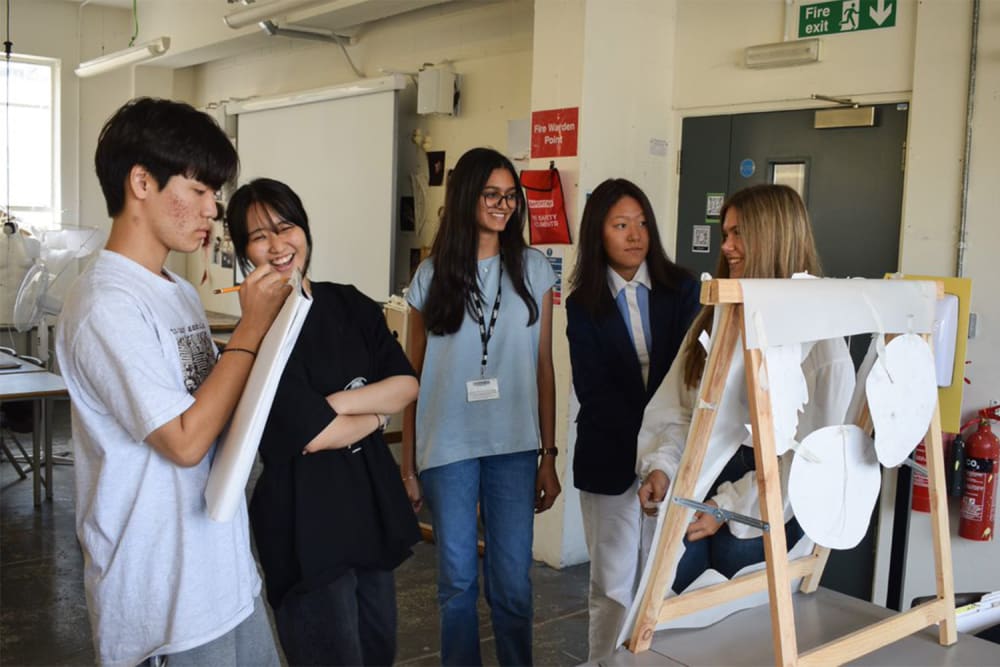 Students working together on the International Summer School Short Course (2022)