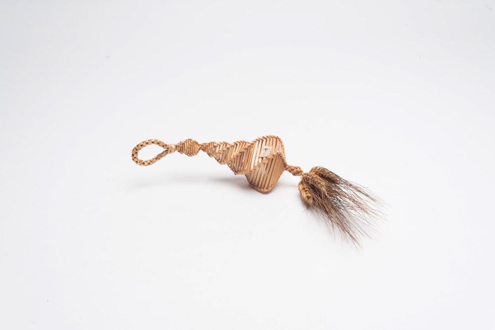 A 'dolly' made from plaited straw