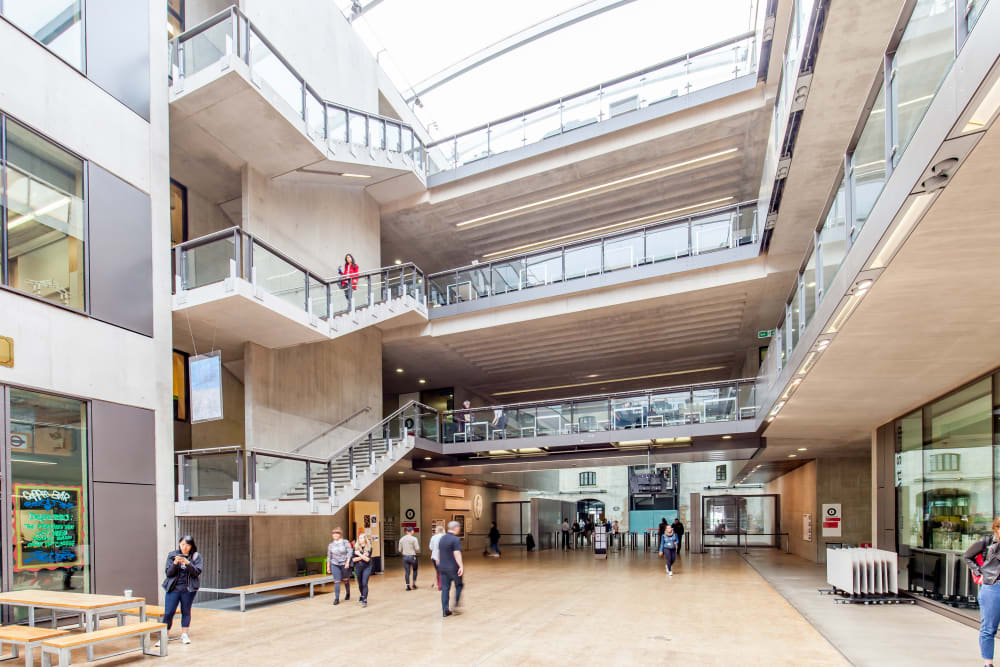 People walking through the Street at Central Saint Martins