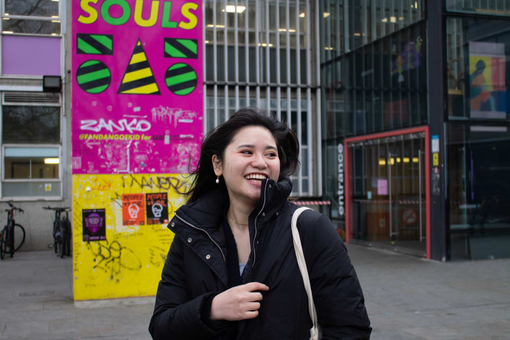 Jazmine smiling outside LCC reception