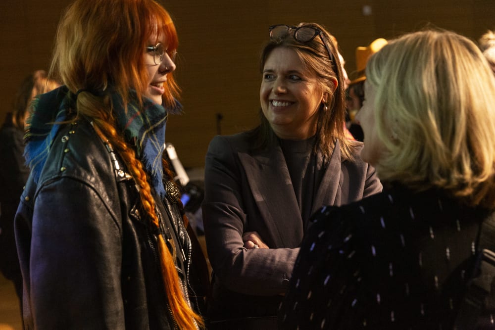 Jenny Packham talking to guests after the talk
