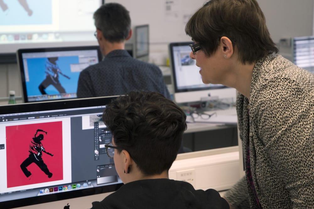 students working in the Mac suite