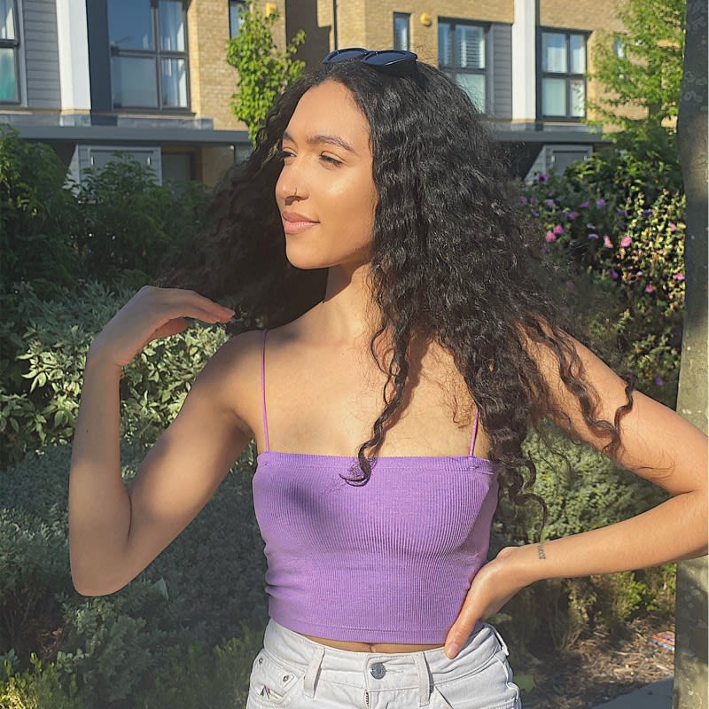 Person standing in front of tress