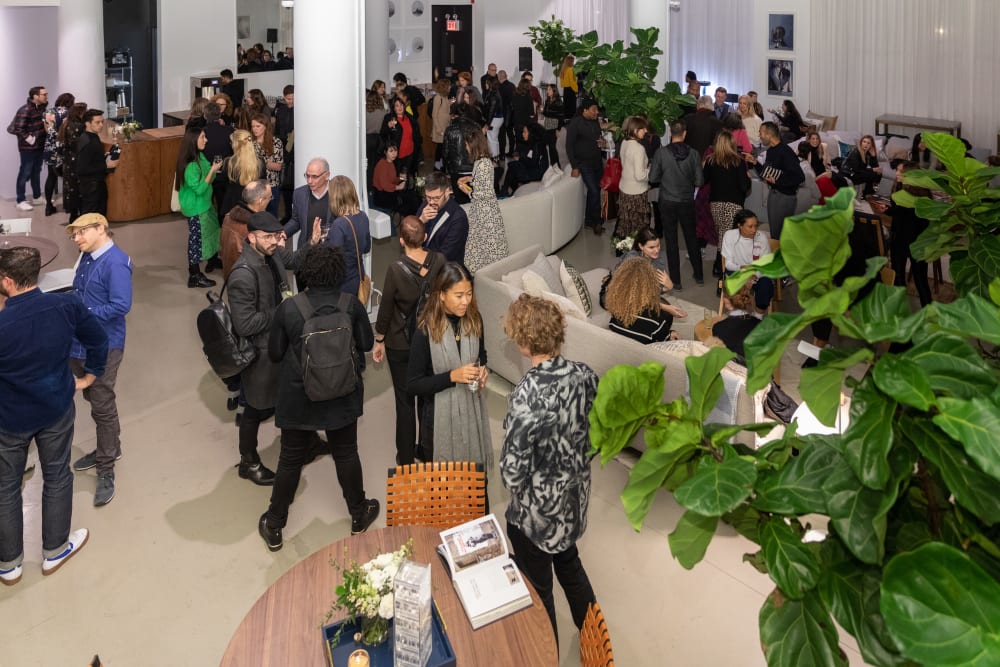 Photo of guests in a room with plants