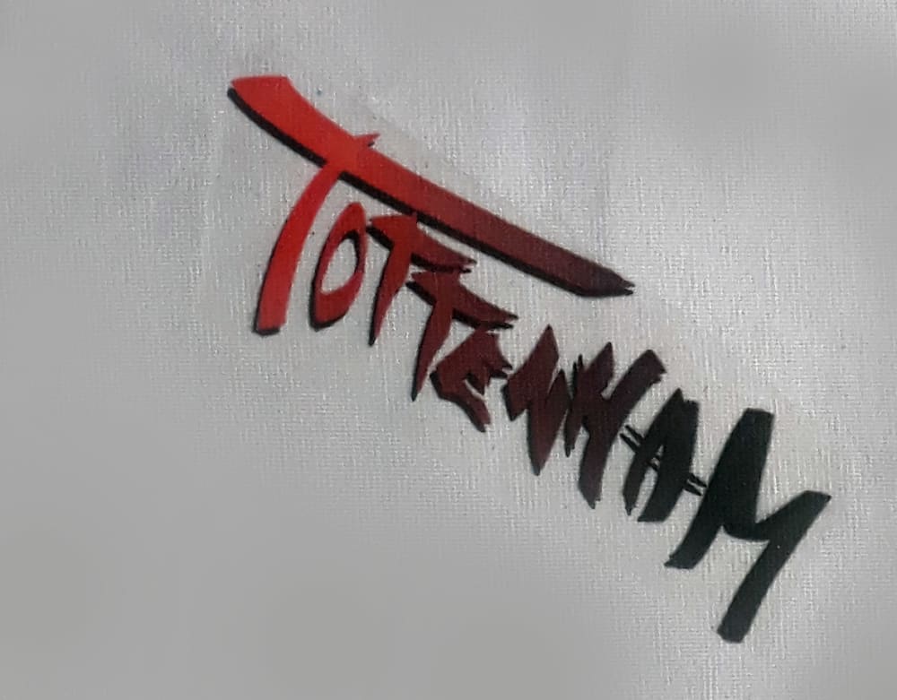 an image of the word 'tottenham' written in a graffiti font in red and black, on a white background