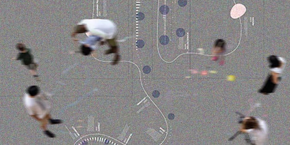 A blurred Birdseye view of people playing on a playground 