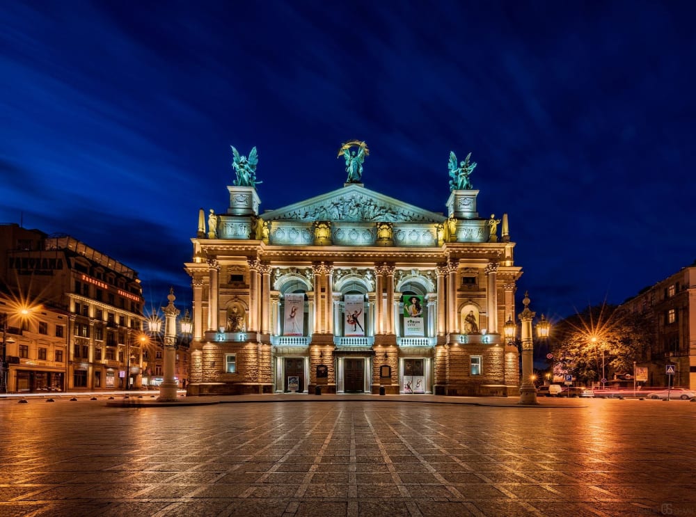 ann old opera house lit up in colours