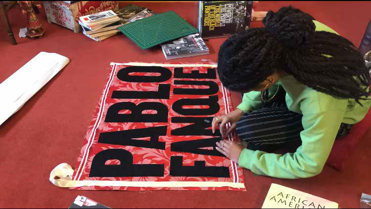 Jahnavi Inniss in the process of making a quilt
