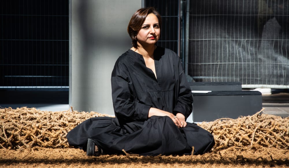 Portrait of woman sitting on net