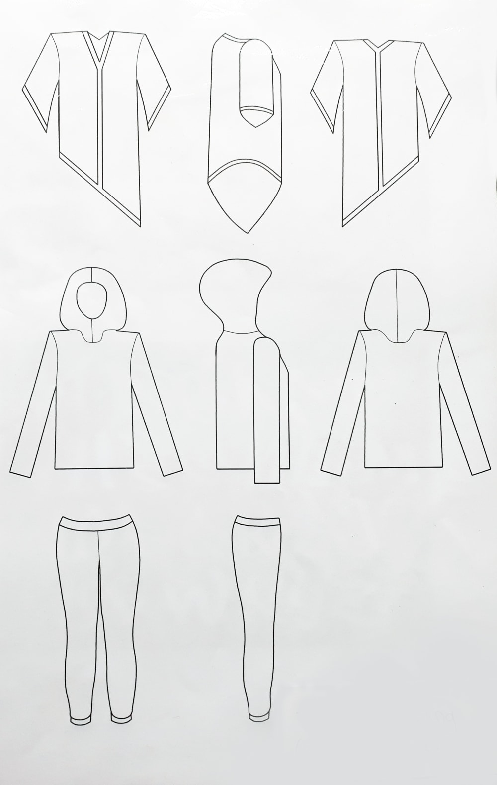 a page detailing fashion sketches of a shirt, hooded jacket and trousers