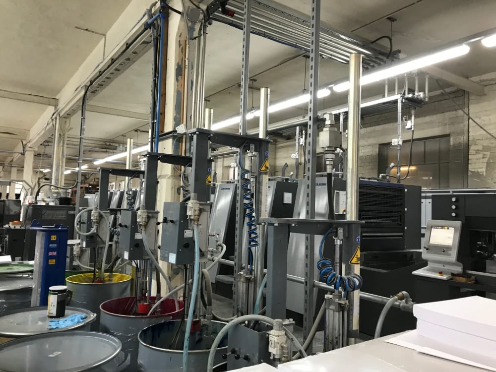 Ink barrels in printing warehouse