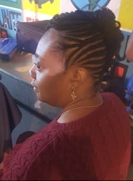 Image of a woman with canerows