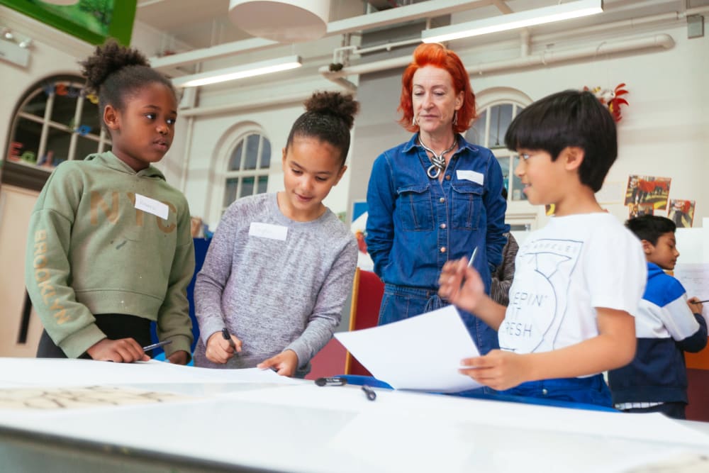 3 Future Creatives students planning their project
