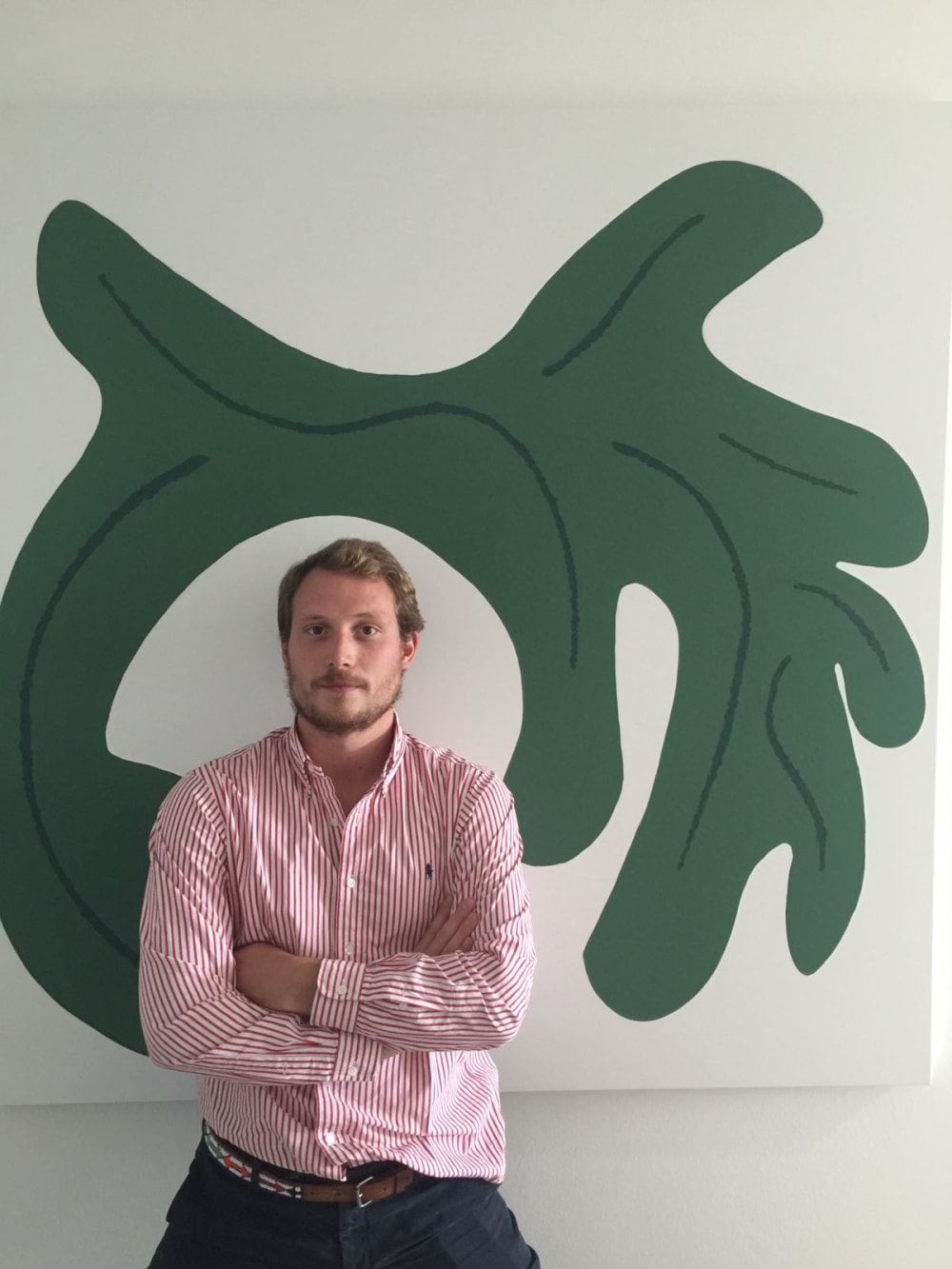 Man in front of wall