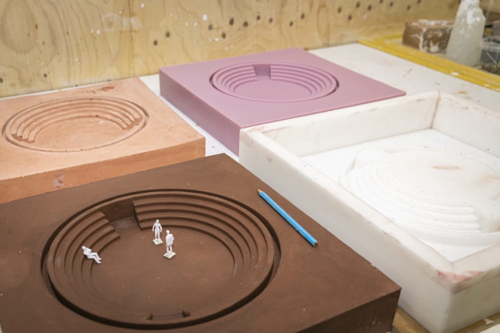 Close of of materials being cast in a workshop