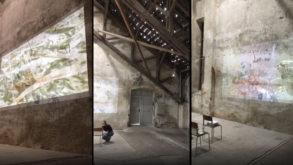 three separate images each showing different angles of a film being projected onto the wall