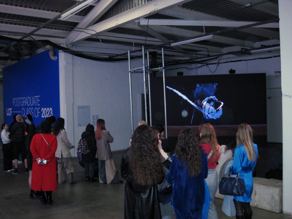 Ode to the Centaur screening at LCF23 postgrad exhibition with people watching