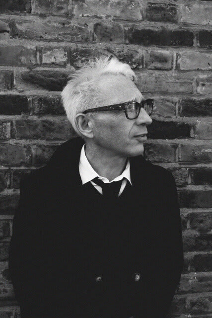 a black and white photo of Richard Cabut