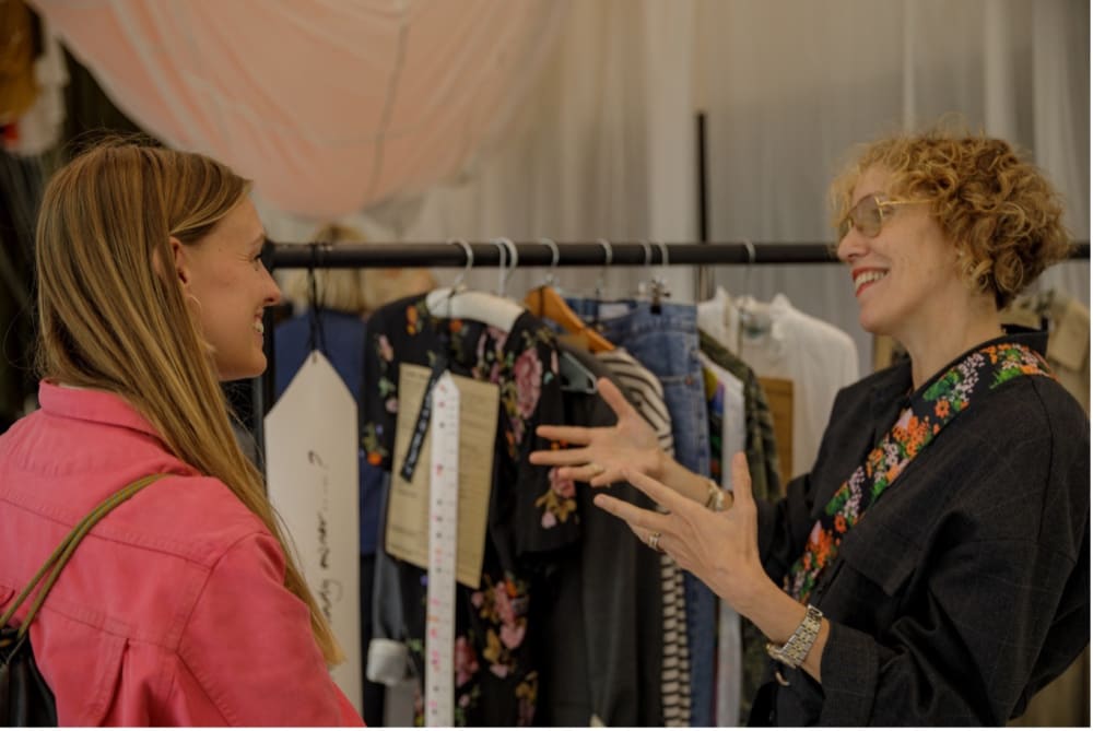 Gemma Metheringham discussing her project with a visitor. Image Credit: Alexa Pollmann.