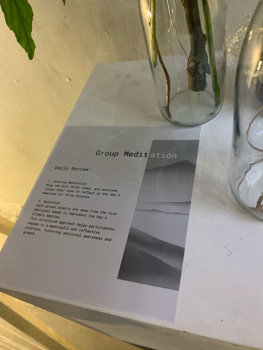 a piece of paper about meditation on a table