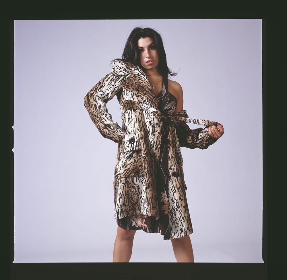 Amy Winehouse in a leopard print coat