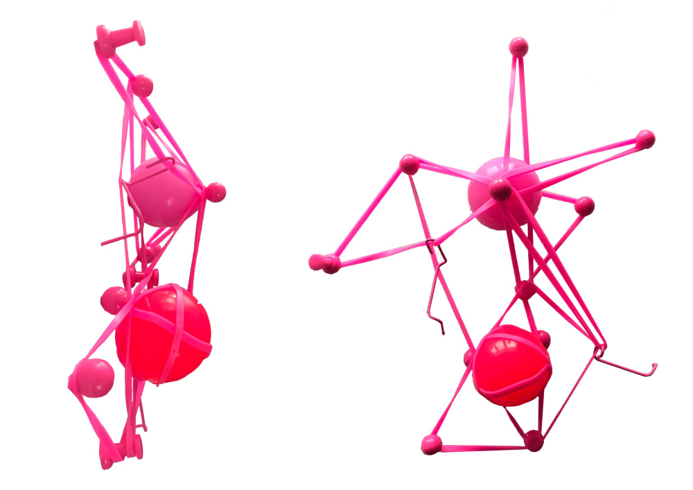 Digital rendering of bright pink geometric shapes