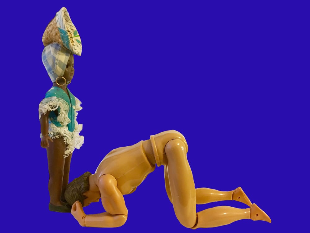 Student work which uses plastic dolls.