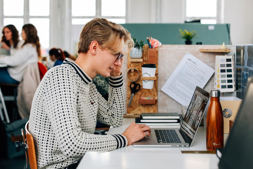 student working on a laptop